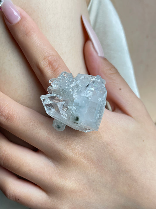 apophyllite-crystal-cluster-ring-hand-close-up