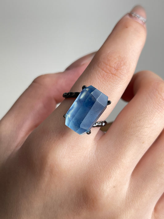 Close-up of Aquamarine freeform ring worn on hand