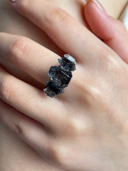 Close-up hand shot of Black Rutilated Quartz and Hakima Diamond Quartz ring