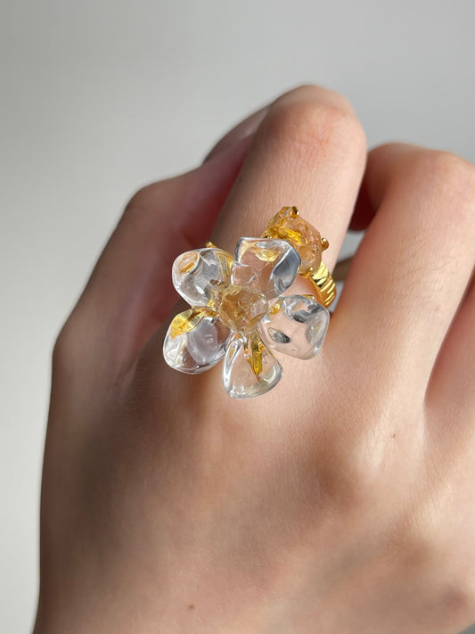 Close-up hand view of Clear Quartz Flower Ring with raw Citrine