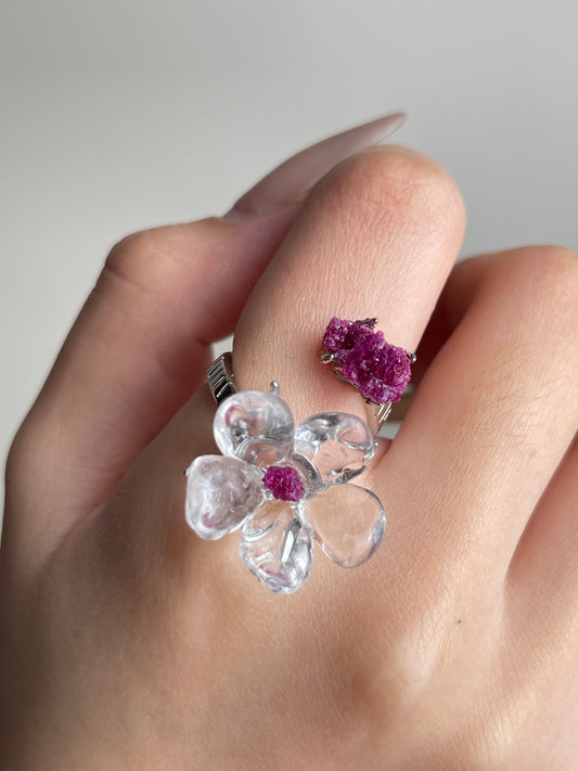 Close-up hand view of Clear Quartz Flower Ring with raw Ruby