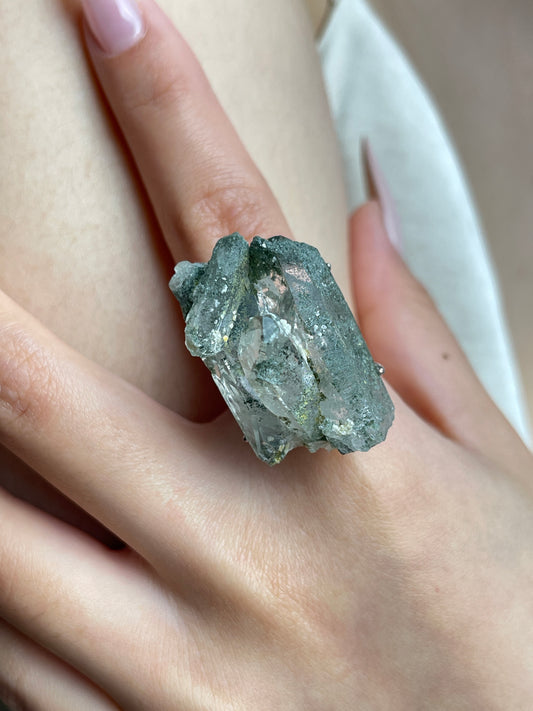 Close-up hand view of Colombian Lemurian Green Phantom Quartz Cluster ring
