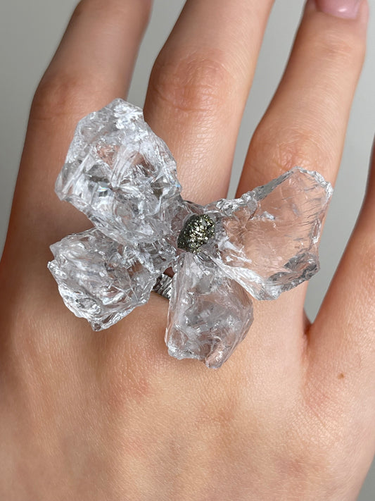 Close-up of Crystal Butterfly Ring worn on hand with Brazilian Quartz and Peruvian Chalcopyrite