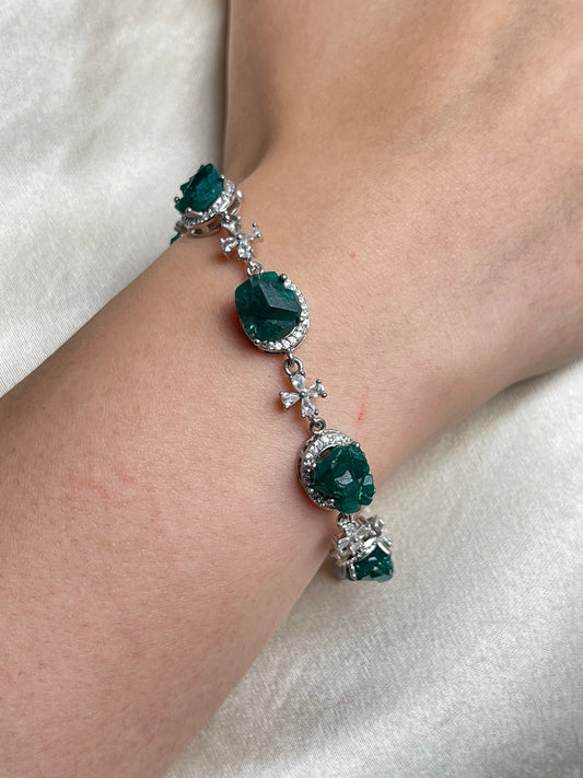 Close-up of dioptase bracelet Congo mineral specimen jewelry worn