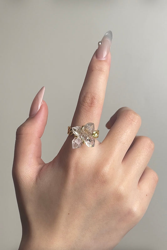 Herkimer Diamond Quartz cross ring worn on hand with gold plated band