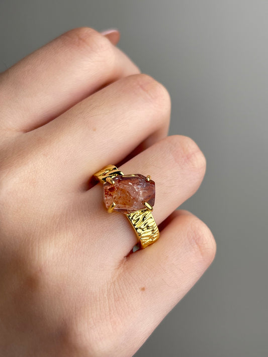 Close-up hand shot of Red Hematoid Quartz Ring showing natural red inclusions