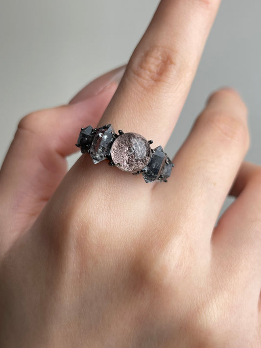 Phantom Quartz and Herkimer Diamond Quartz Ring close-up worn on hand
