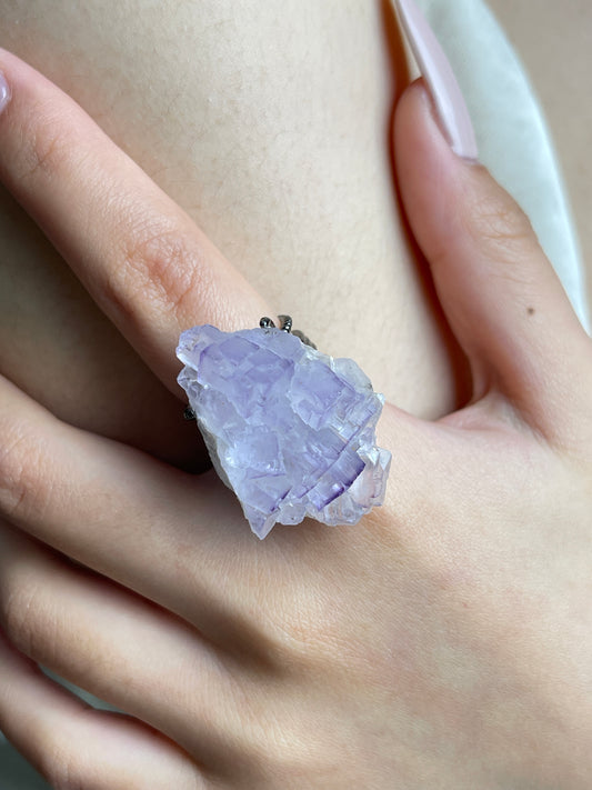 Close-up of Natural Purple Cubic Fluorite Crystal Ring worn on hand