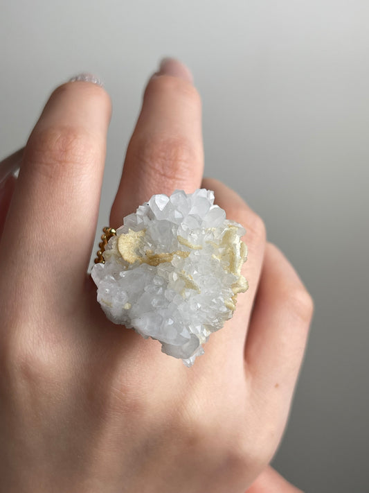 Quartz Cluster with Calcite Ring close-up worn on hand