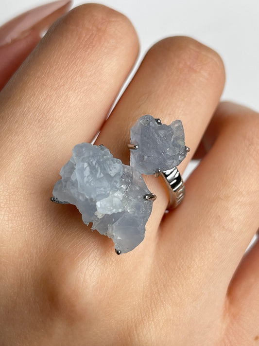Close-up of raw Celestite twin ring from Madagascar worn on hand