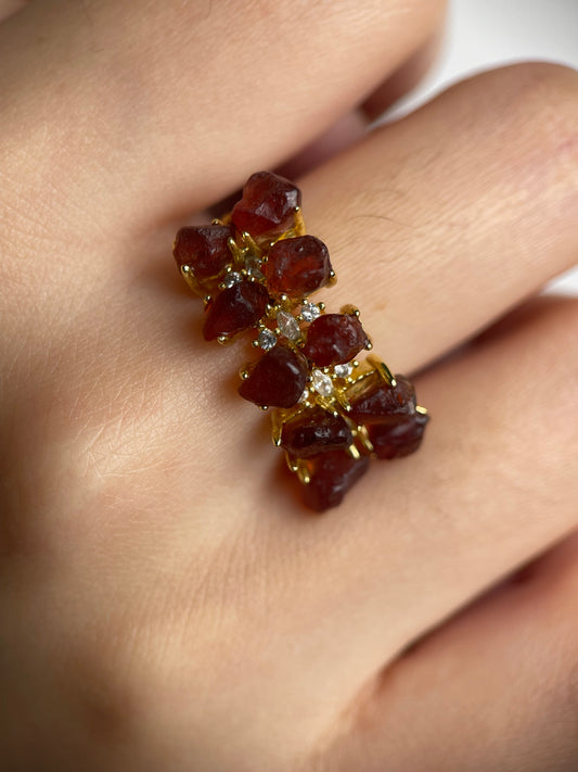 close up look raw garnet double row ring