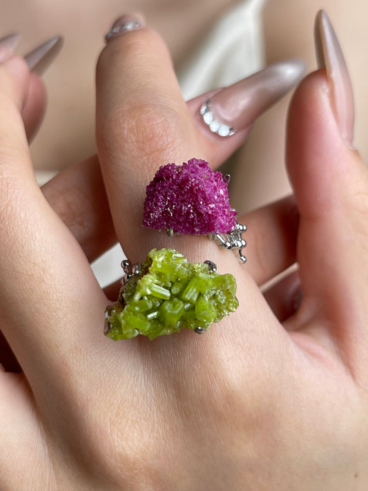 Close-up hand shot of Ruby Red Corundum and Pyromorphite mineral specimen ring