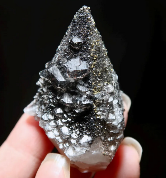 Black Calcite: The Crystal of Deep Grounding, Emotional Release, and Energetic Renewal