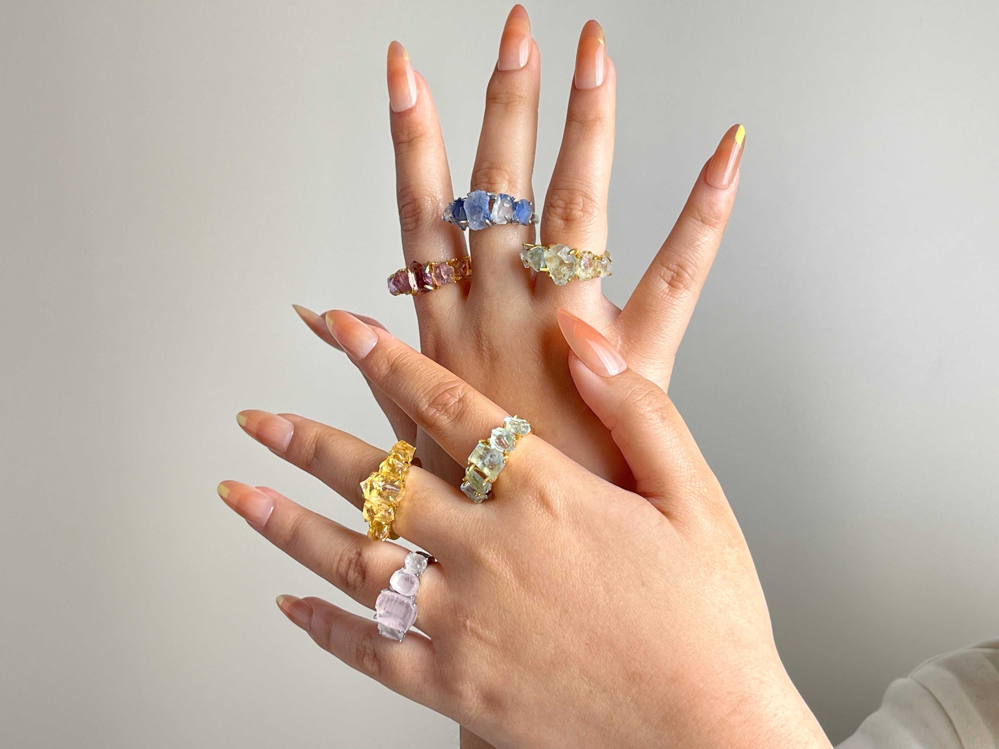 Oryssia raw crystal band rings on hands