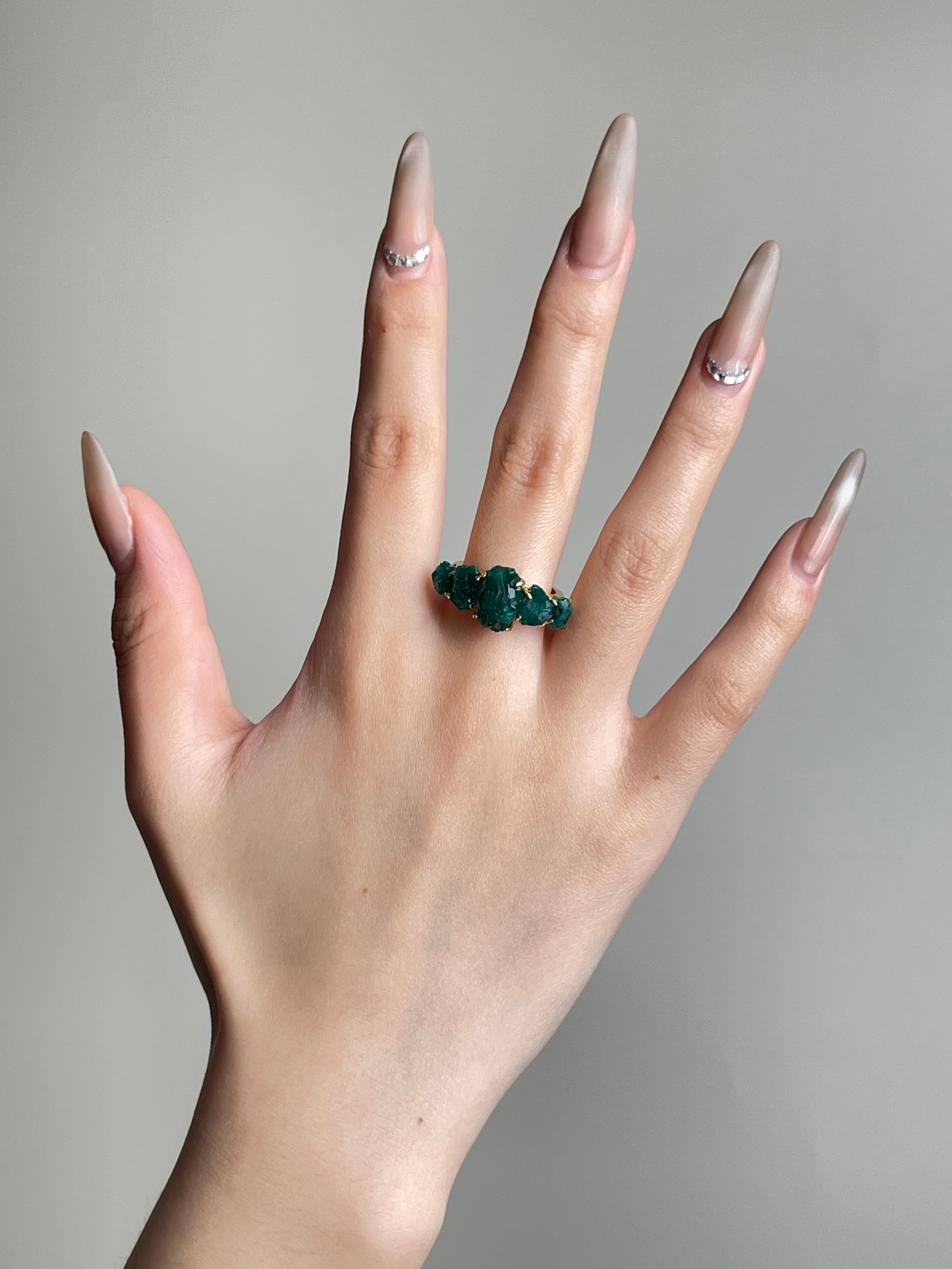 Raw Dioptase Crystal Band Ring worn on hand