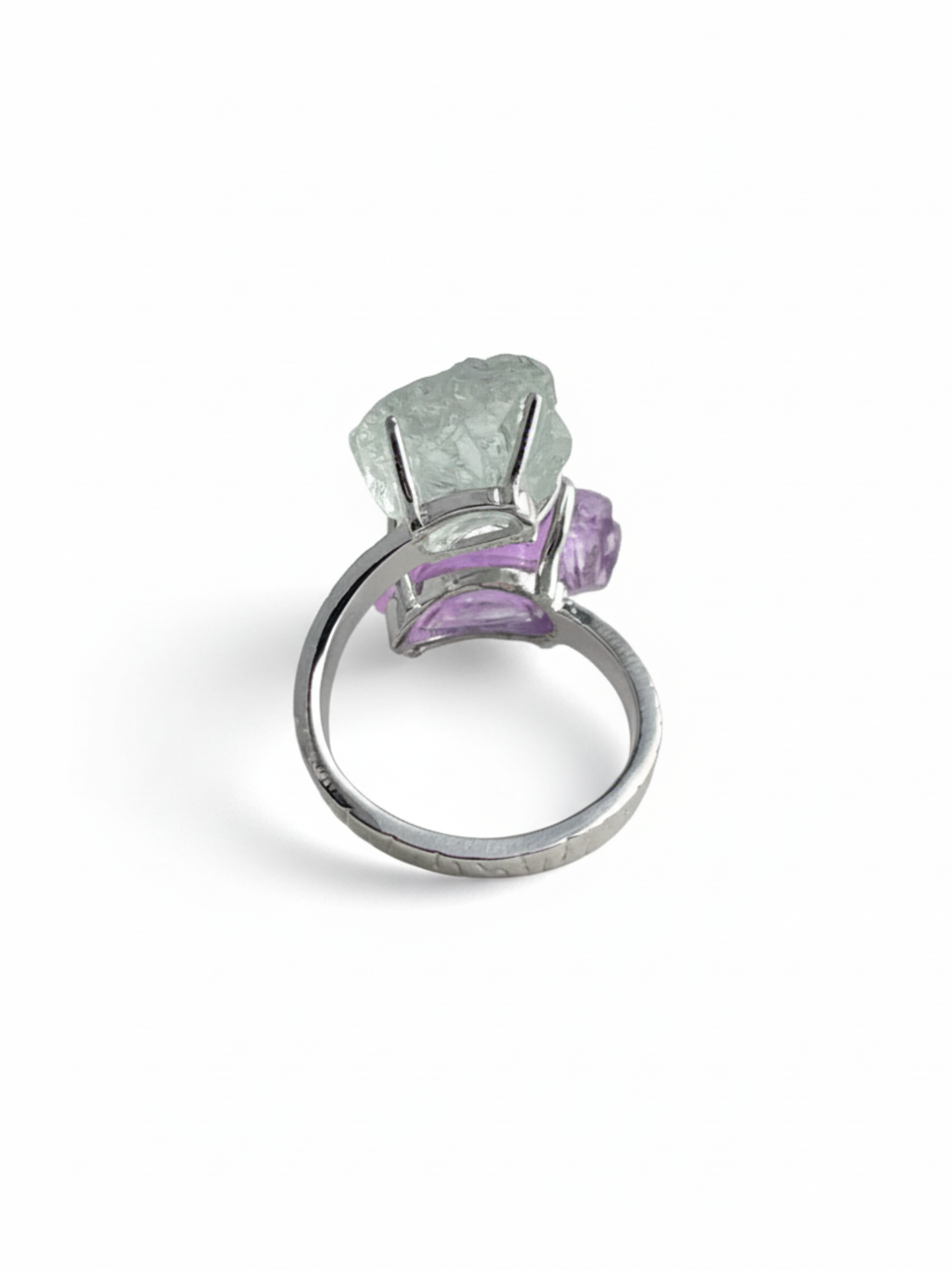 Back view of amethyst and green quartz raw crystal twin ring adjustable band