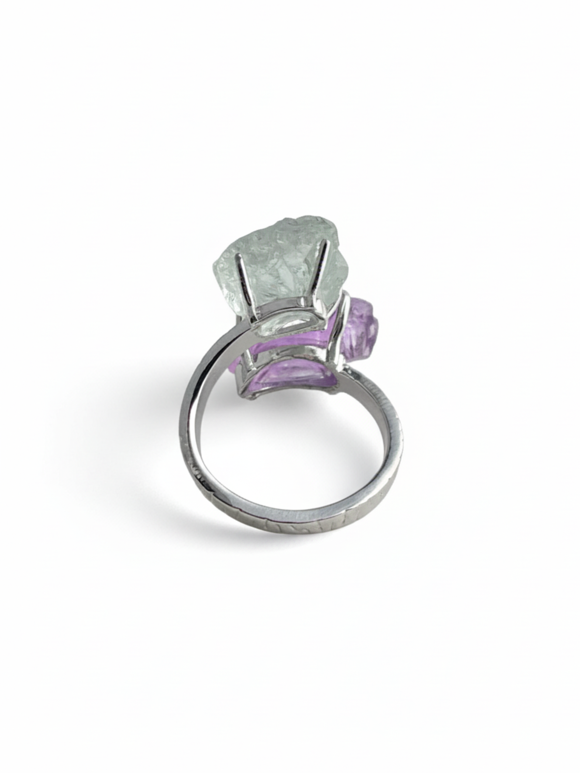 Back view of amethyst and green quartz raw crystal twin ring adjustable band