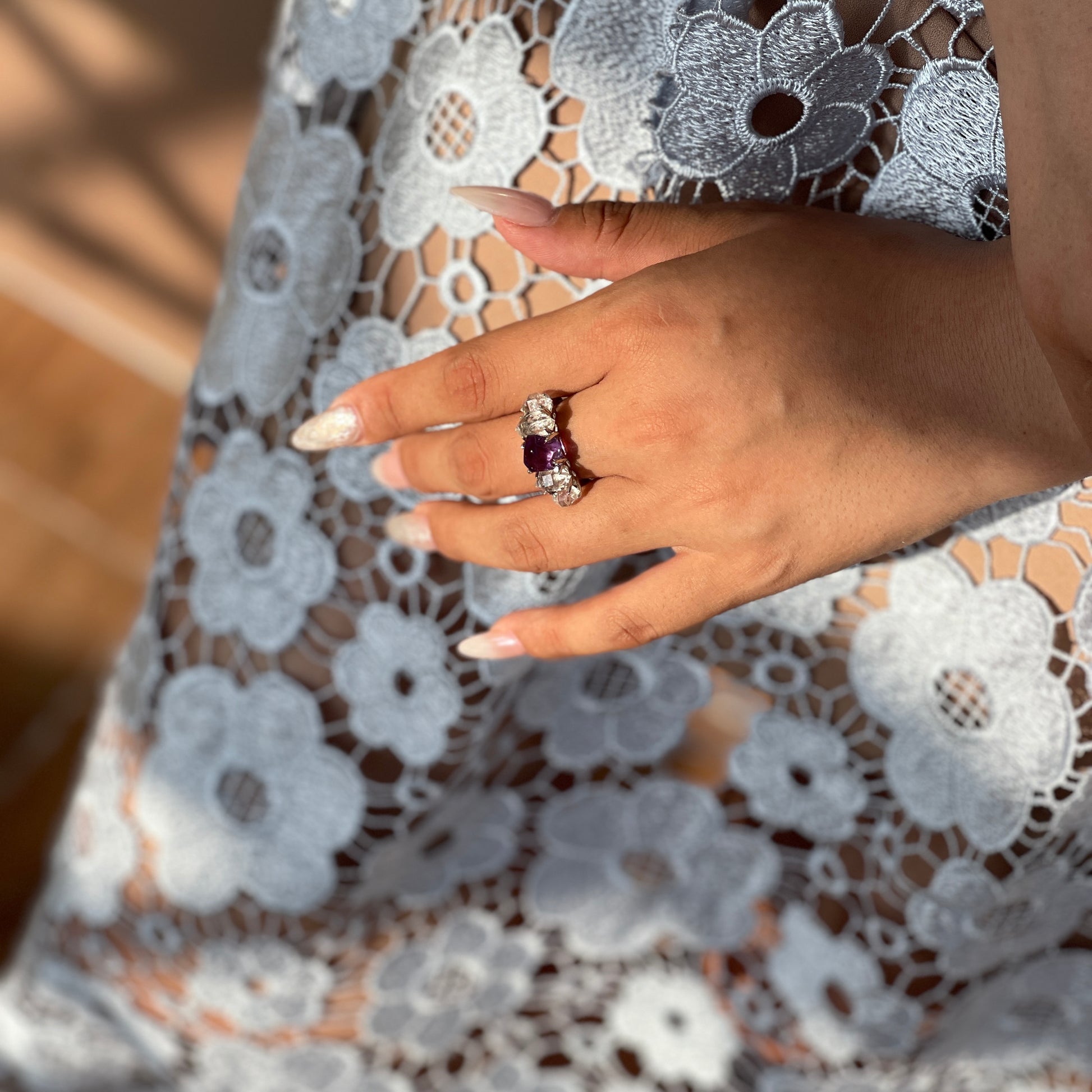Amethyst and Herkimer Diamond Quartz band ring worn on hand, showing freeform purple amethyst and clear natural crystals