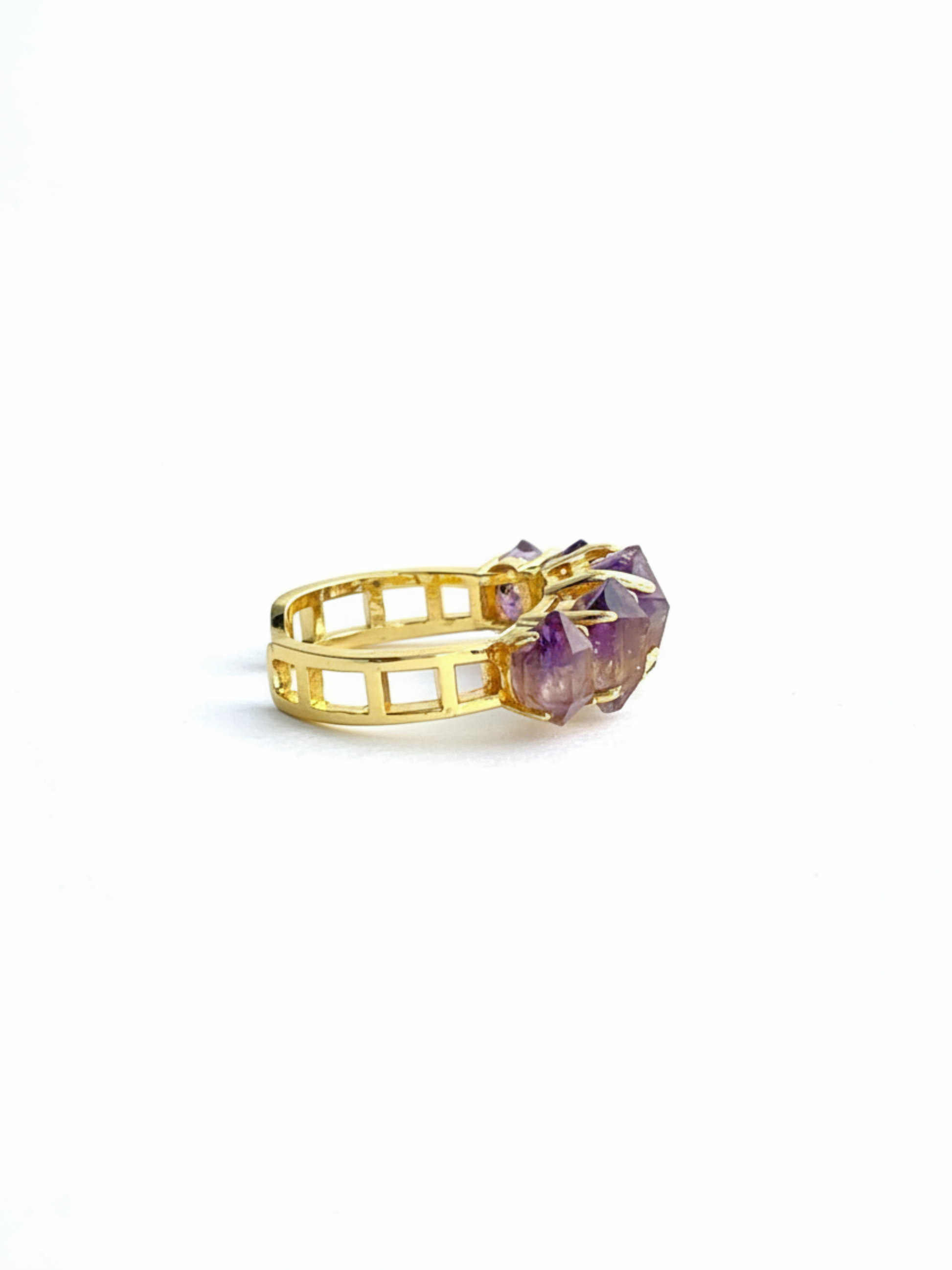Side view of raw Amethyst Super Seven crystal band ring