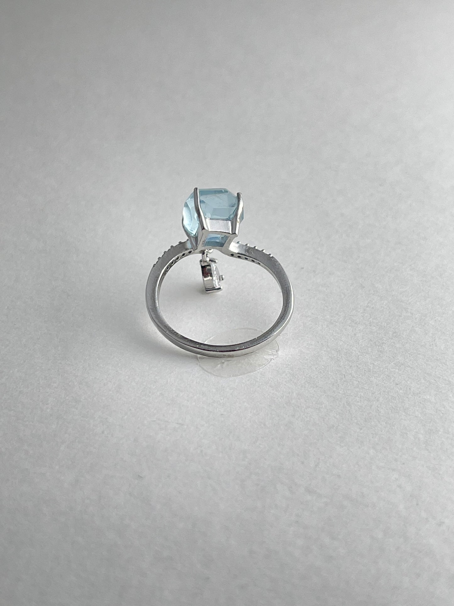 Back view of aquamarine ring open band design