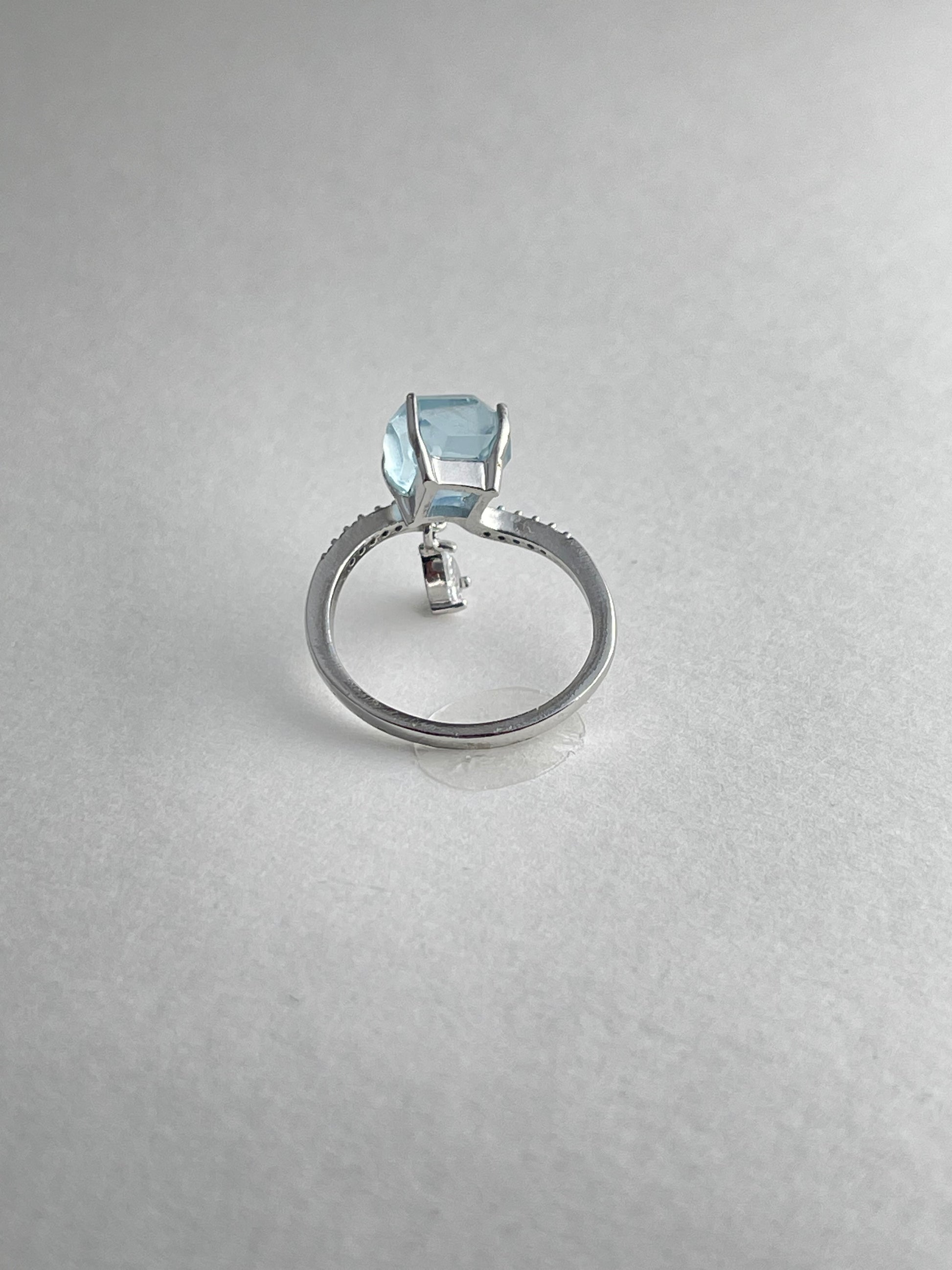 Back view of aquamarine ring open band design