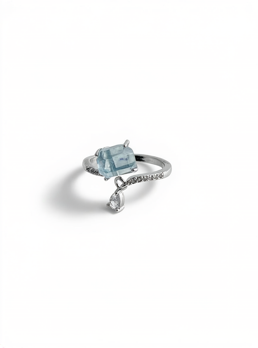 Hand-cut aquamarine ring front view showing soft blue crystal