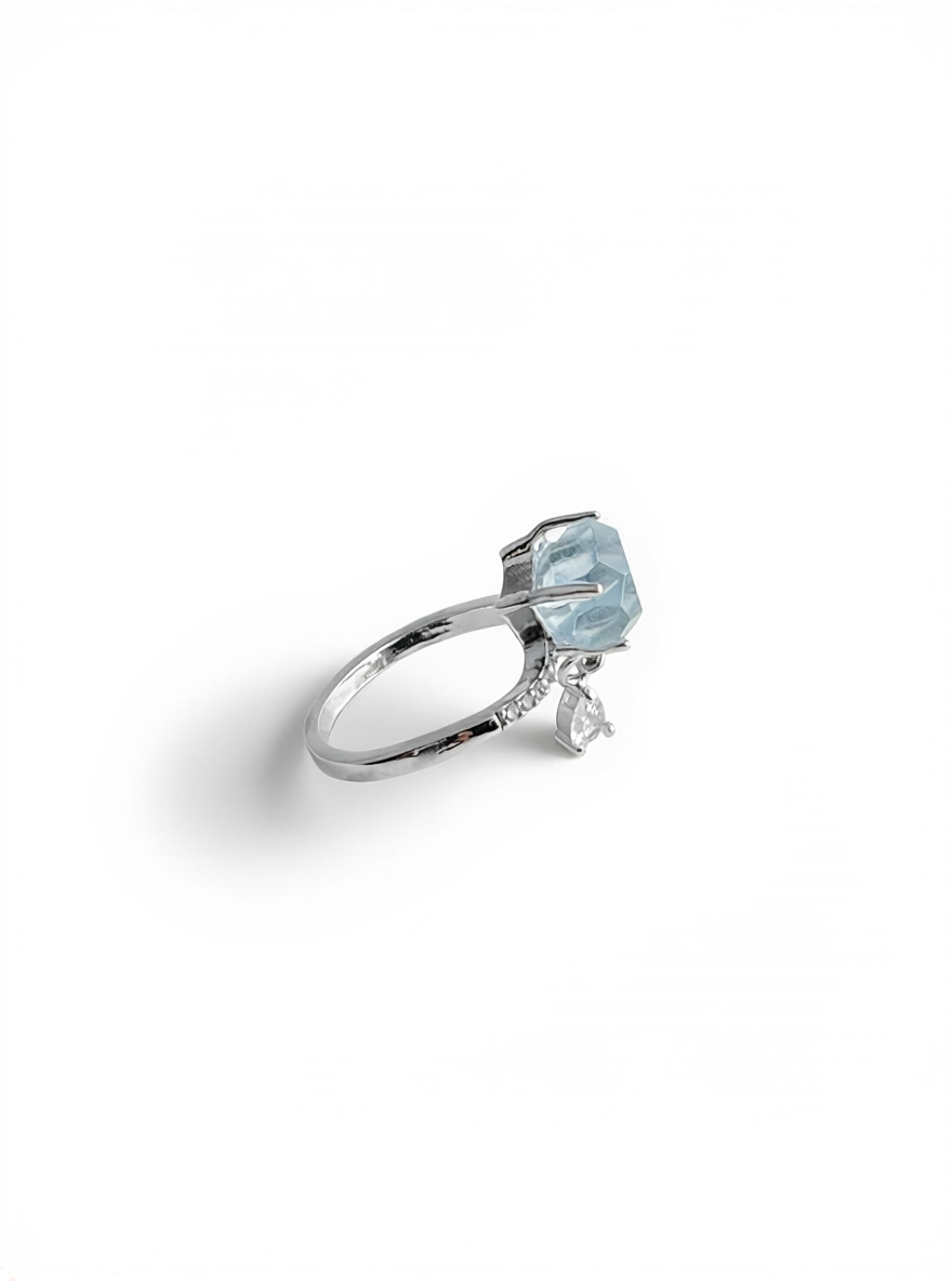 Side view of aquamarine ring with adjustable band