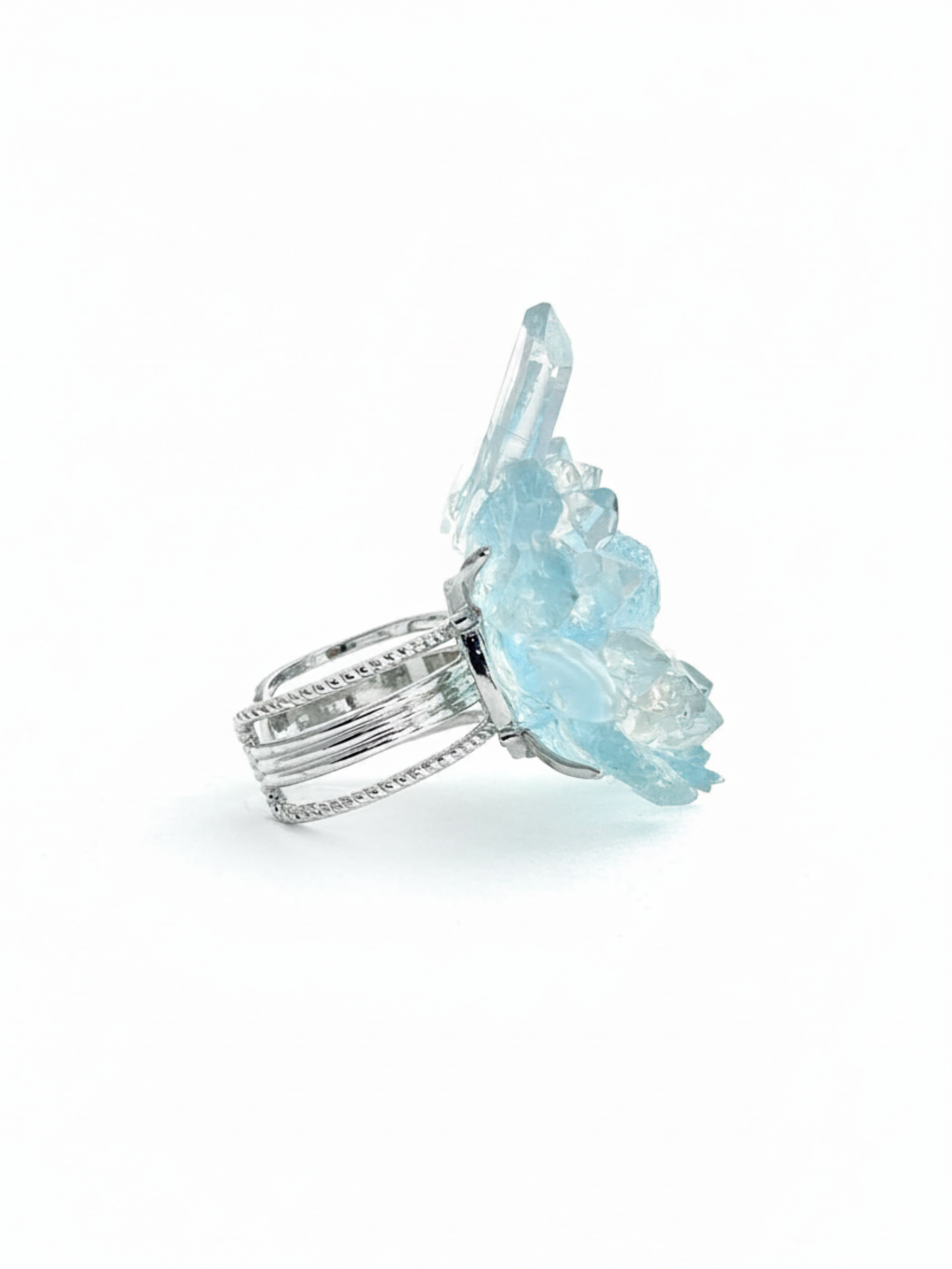Side view of raw aquamarine Herkimer Diamond Quartz and clear quartz flower ring