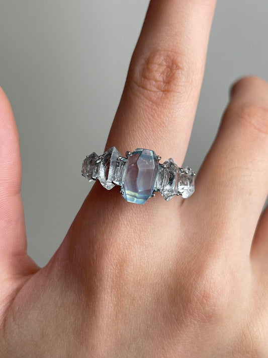 Aquamarine and Herkimer Diamond Quartz Ring close-up worn on hand