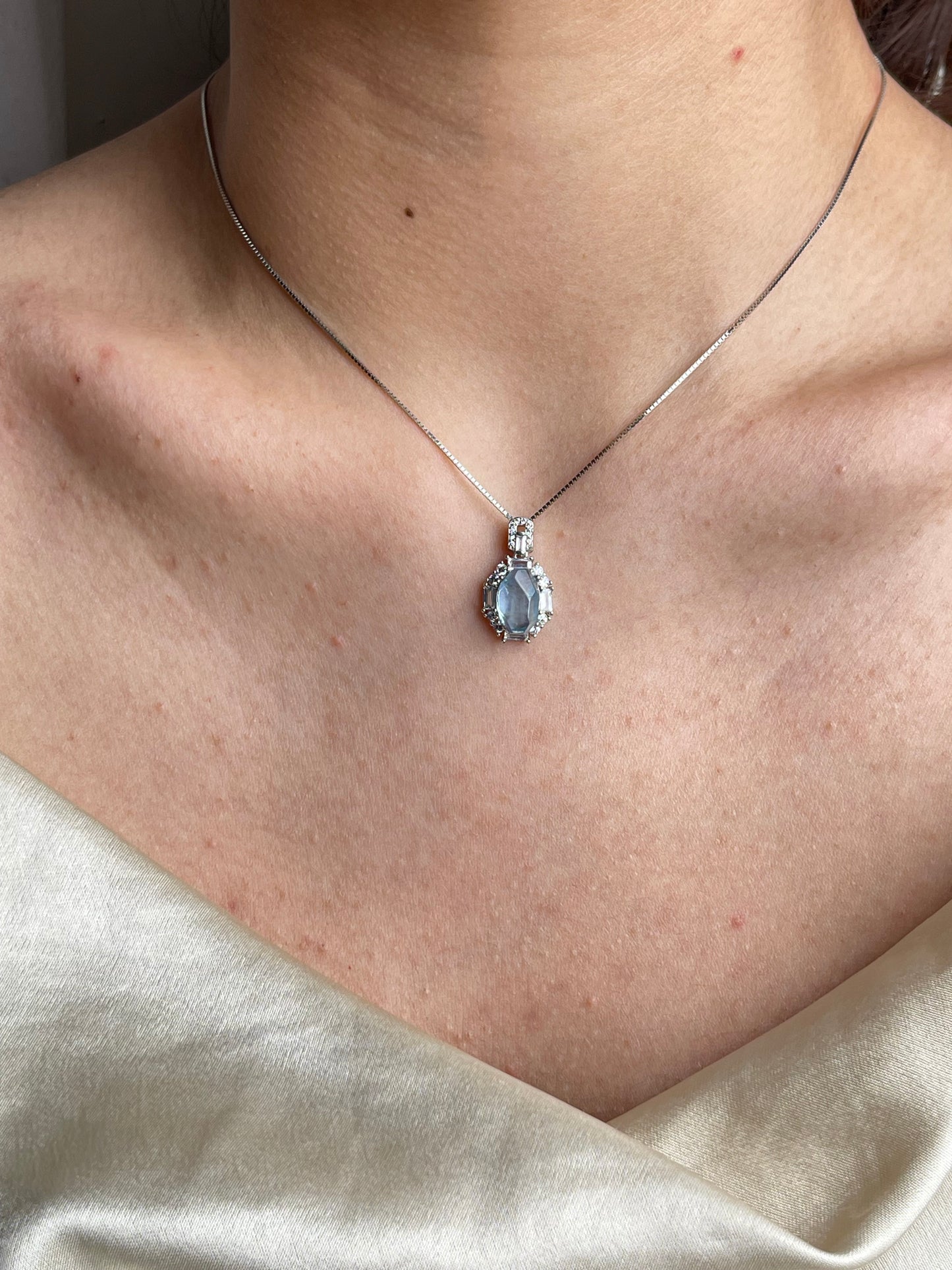 Aquamarine necklace with Brazilian Aquamarine worn on neck