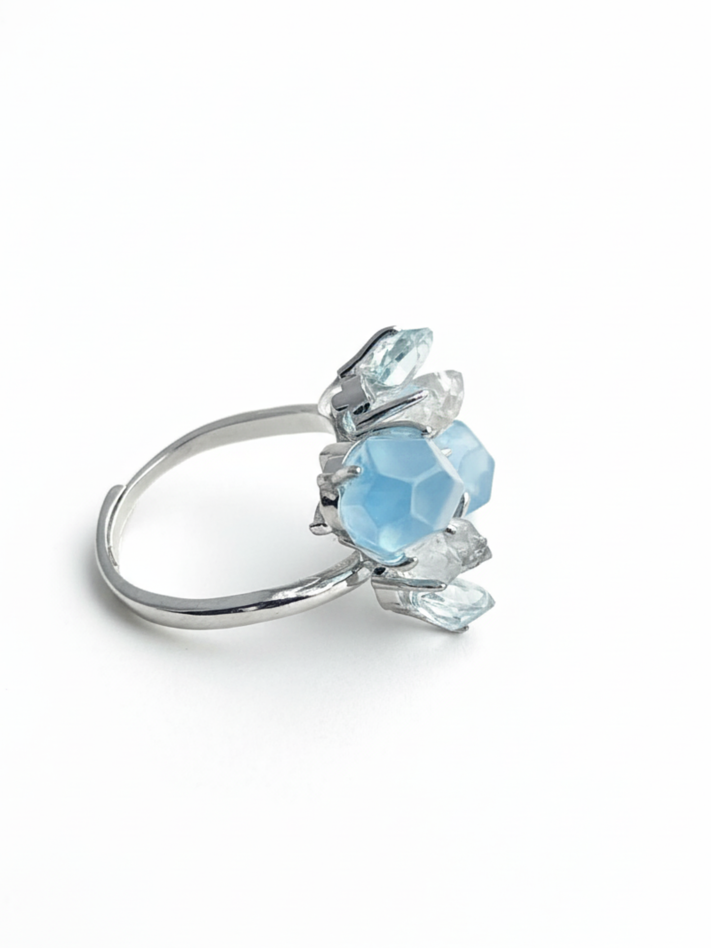 Side view of aquamarine ring with blue topaz and Hakima Diamond quartz natural crystal jewelry