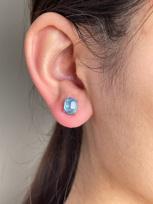 Aquamarine Stud Earrings close-up worn on ear