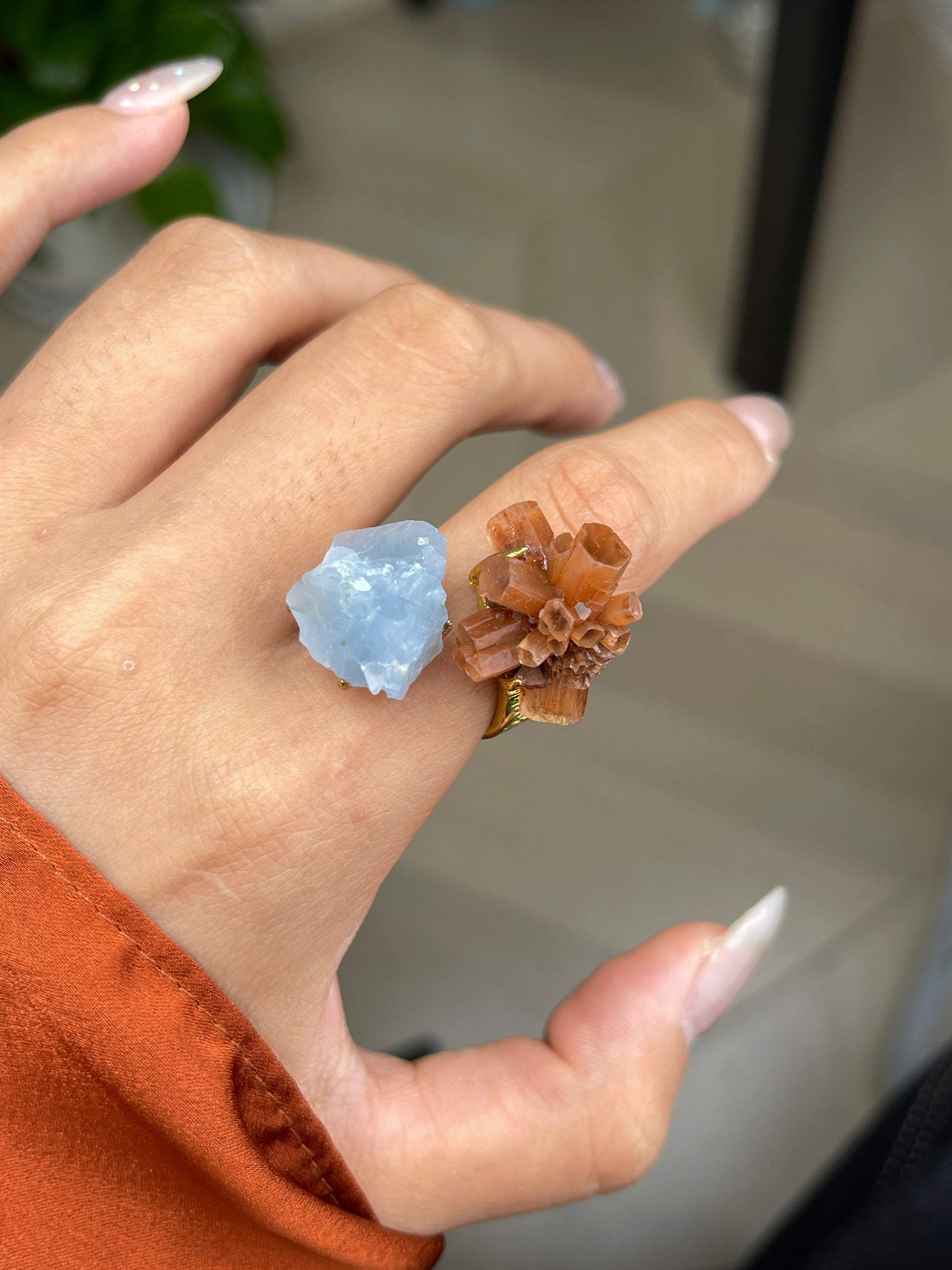 Aragonite Cluster and Blue Calcite Mineral Specimen Ring, close-up on hand