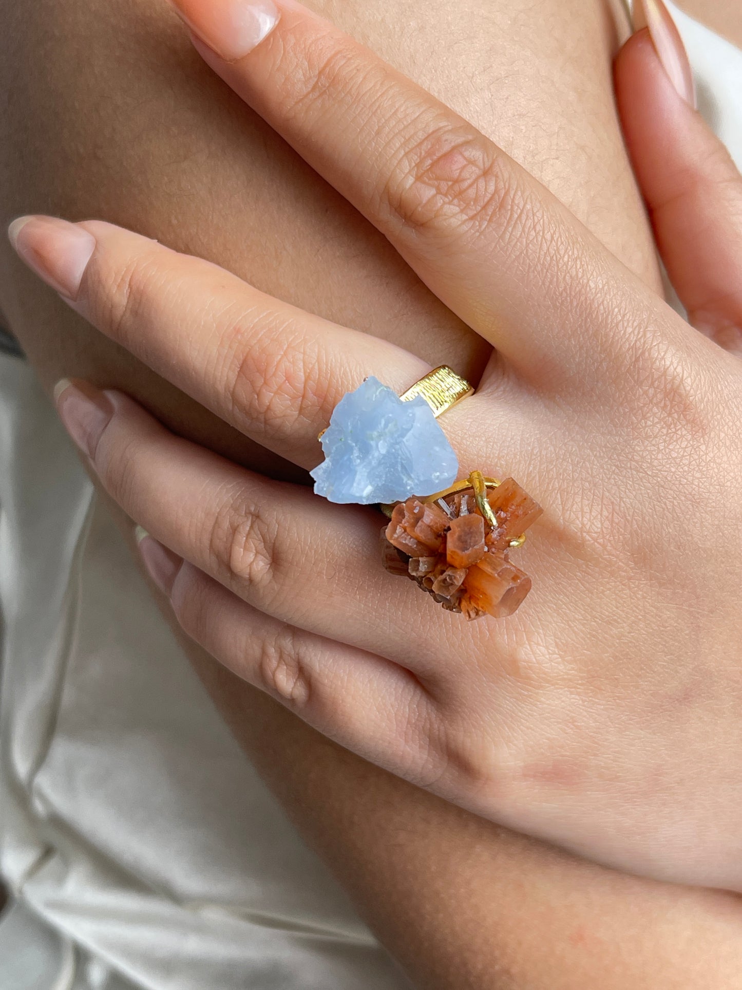 Aragonite Cluster and Blue Calcite Mineral Specimen Ring, close-up on hand