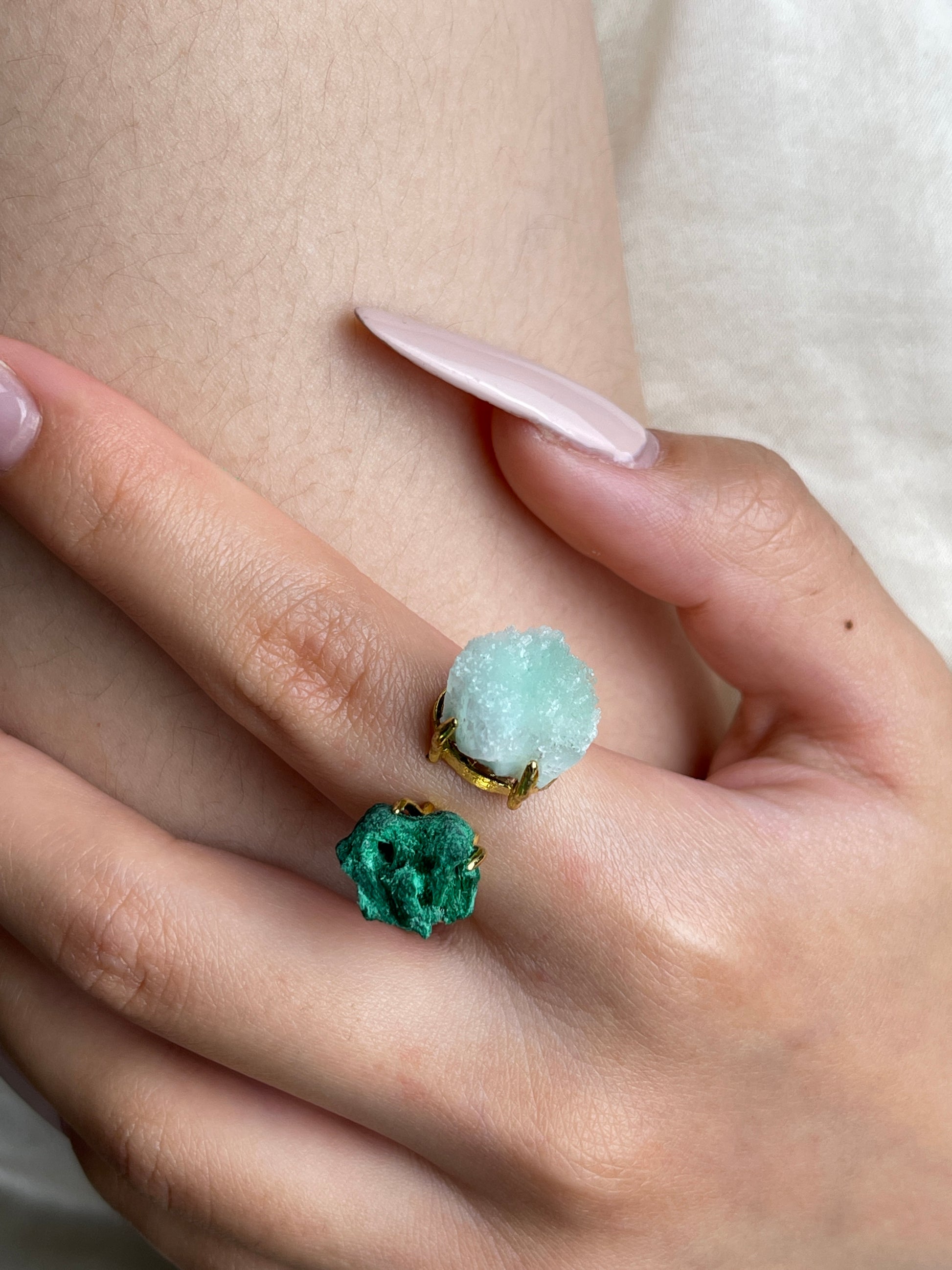 Close up of raw Blue Aragonite and Fibrous Malachite ring on hand