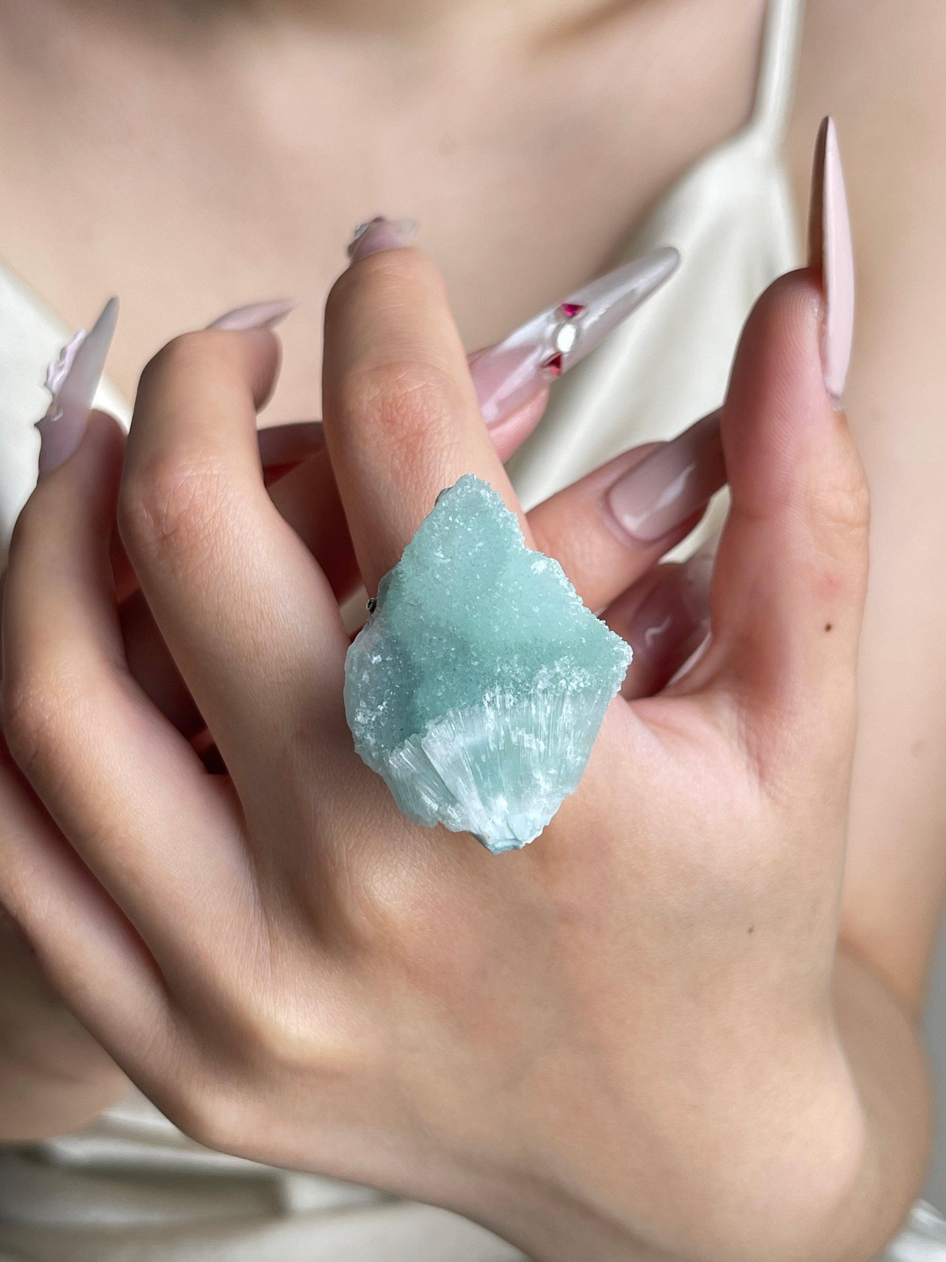 Blue Aragonite mineral specimen ring worn on hand