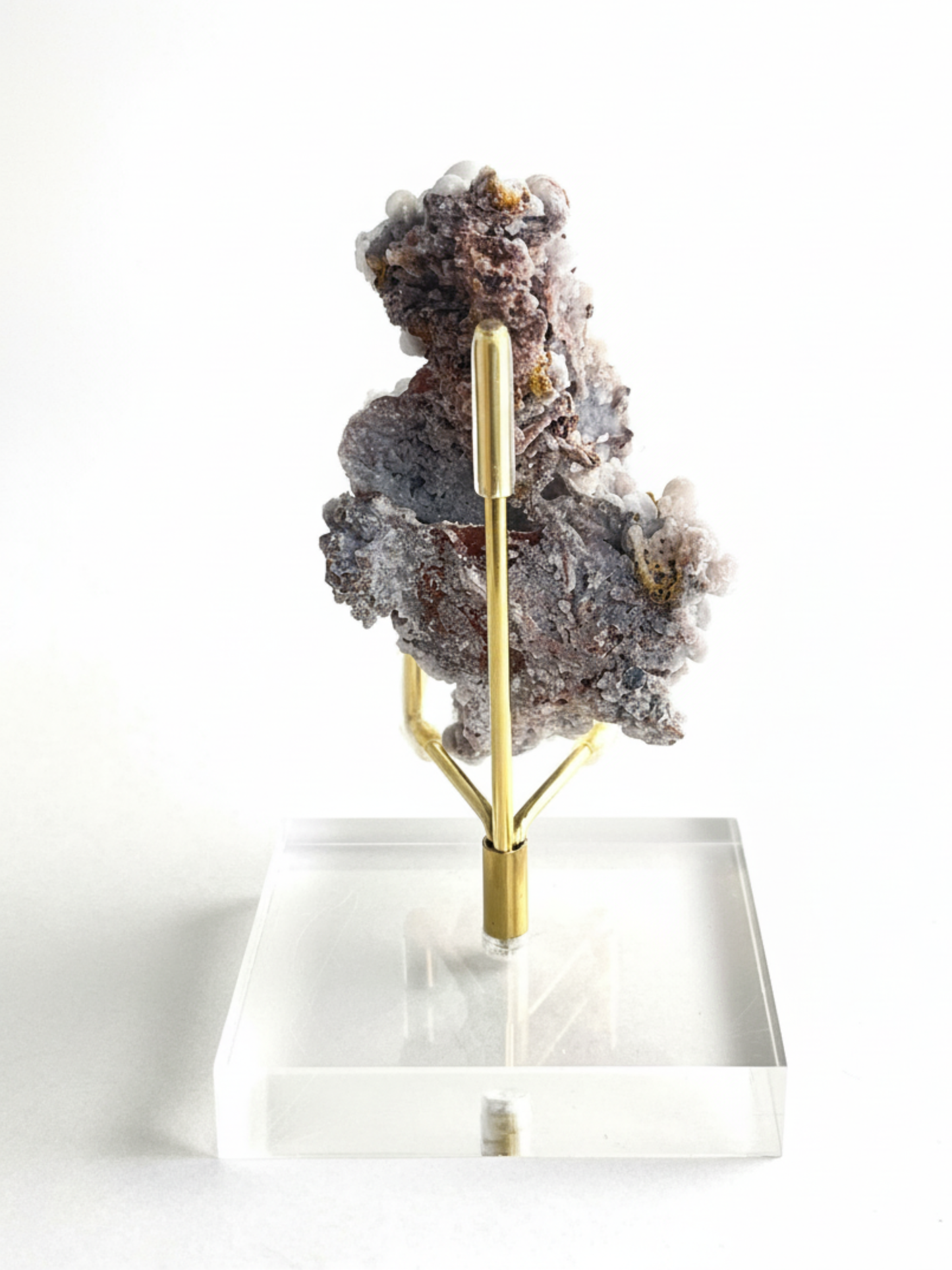 mineral specimen back view with iron stained matrix