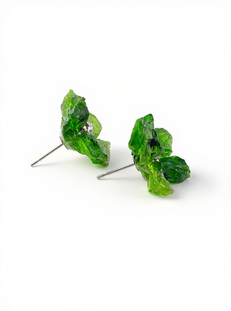 Side view of raw mineral flower stud earrings