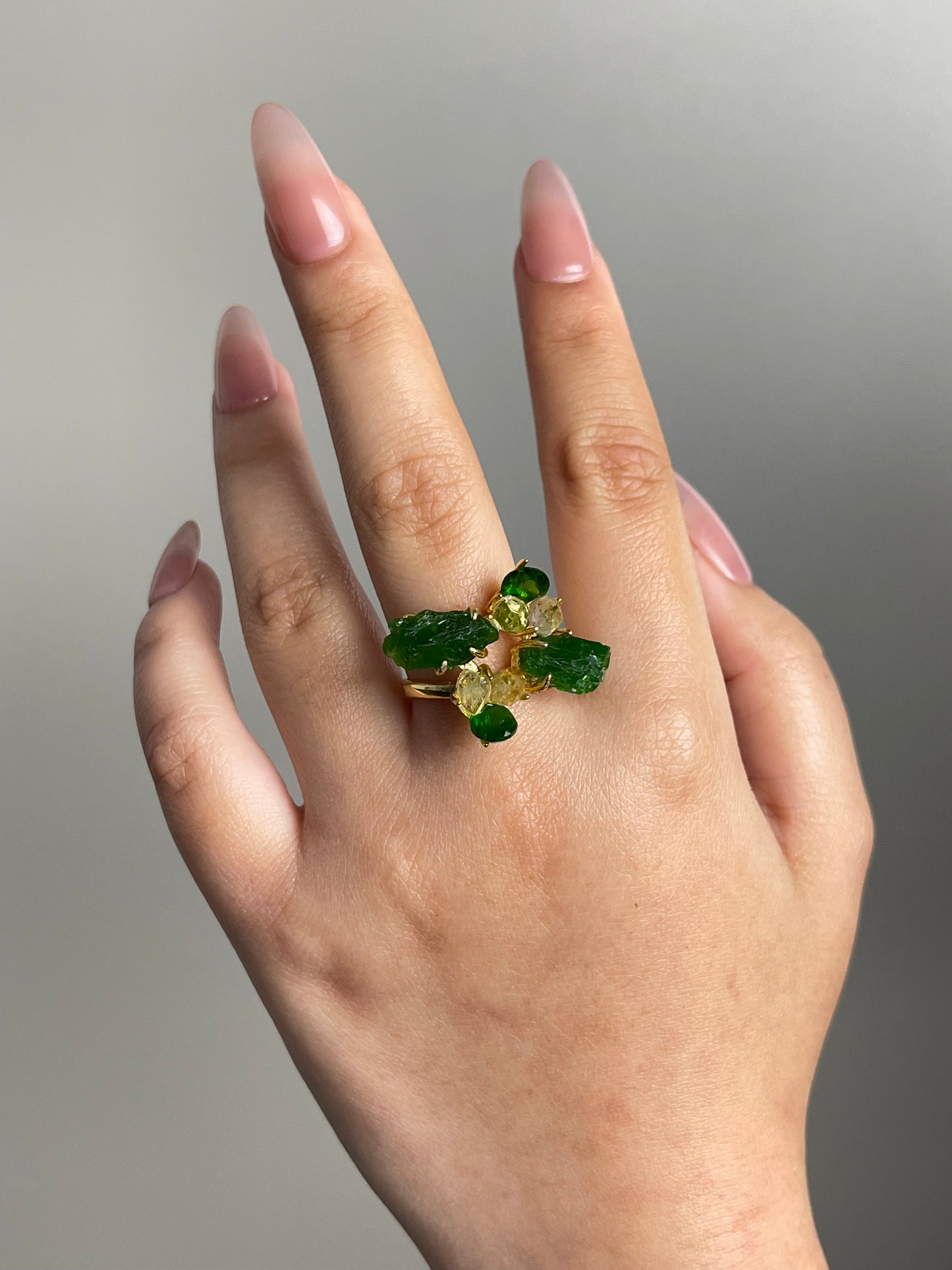 chrome diopside and herkimer diamond crystal ring worn on hand