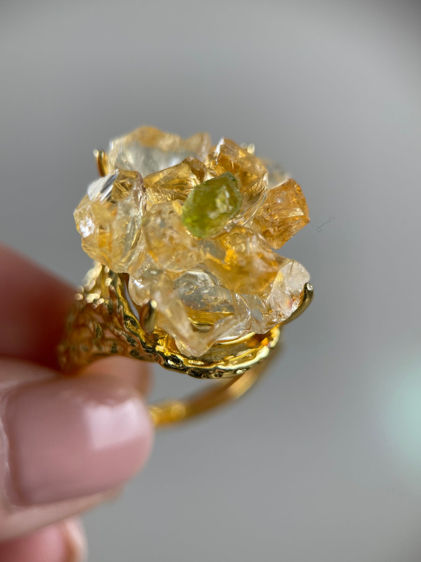 close up citrine peridot crystal blossom ring