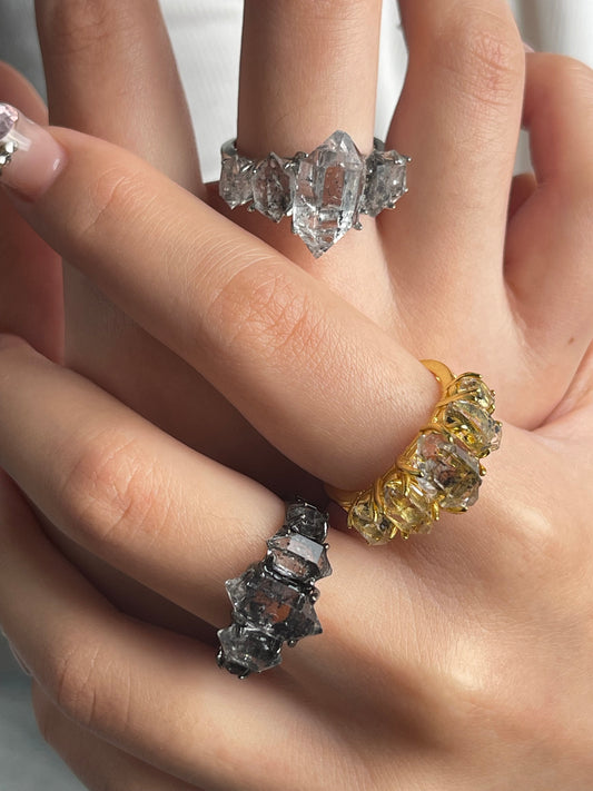 close up clear herkimer diamond quartz row ring