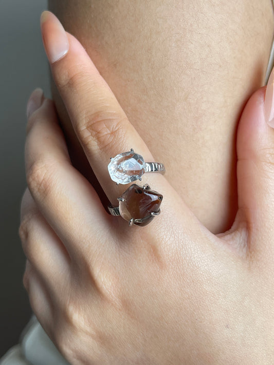 Clear Quartz and Smoky Quartz Freeform Ring, close-up on hand
