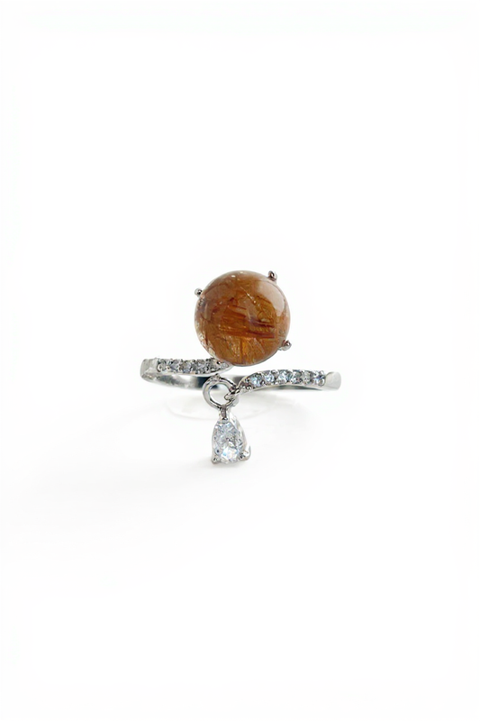 Copper rutilated quartz ring front view showing golden needle inclusions