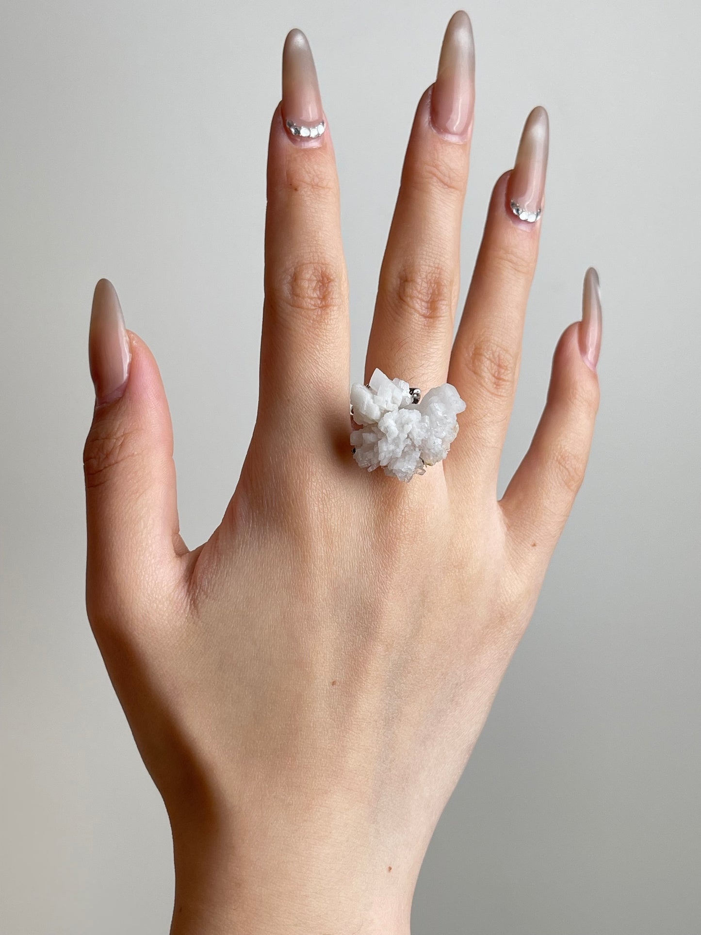 Creedite Ring worn on hand