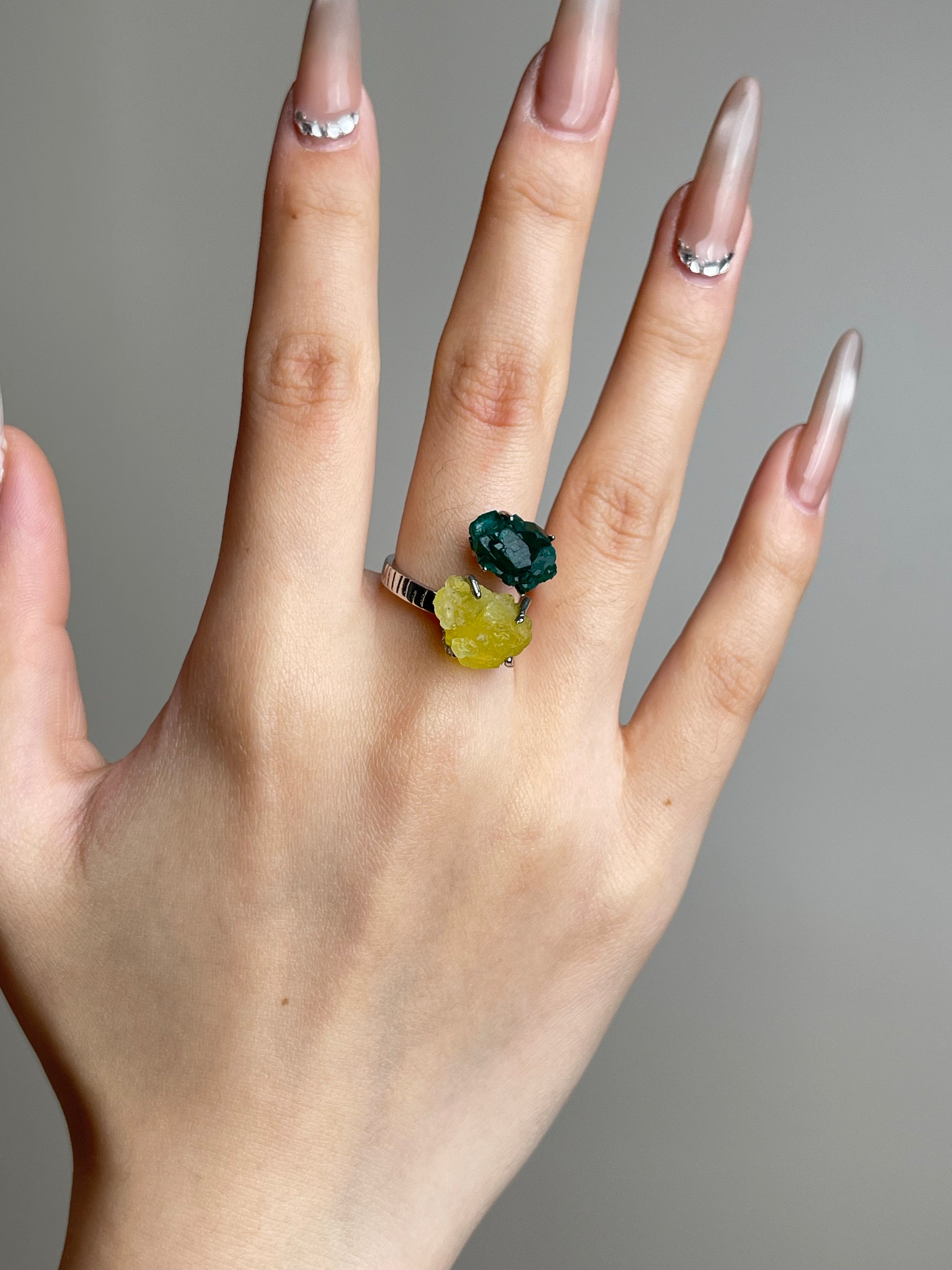 Hand shot of Dioptase and Brucite ring by Oryssia