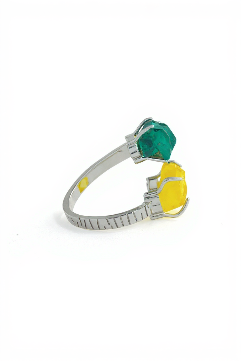 Side view of Dioptase and Brucite ring with raw mineral crystals