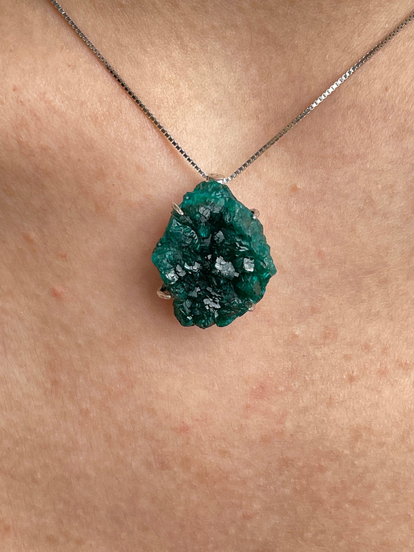 Close-up of Dioptase necklace Congo mineral specimen jewelry worn