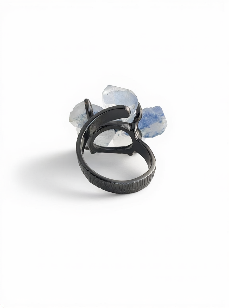 Back view of dumortierite quartz flower ring with tanzanite fluorite