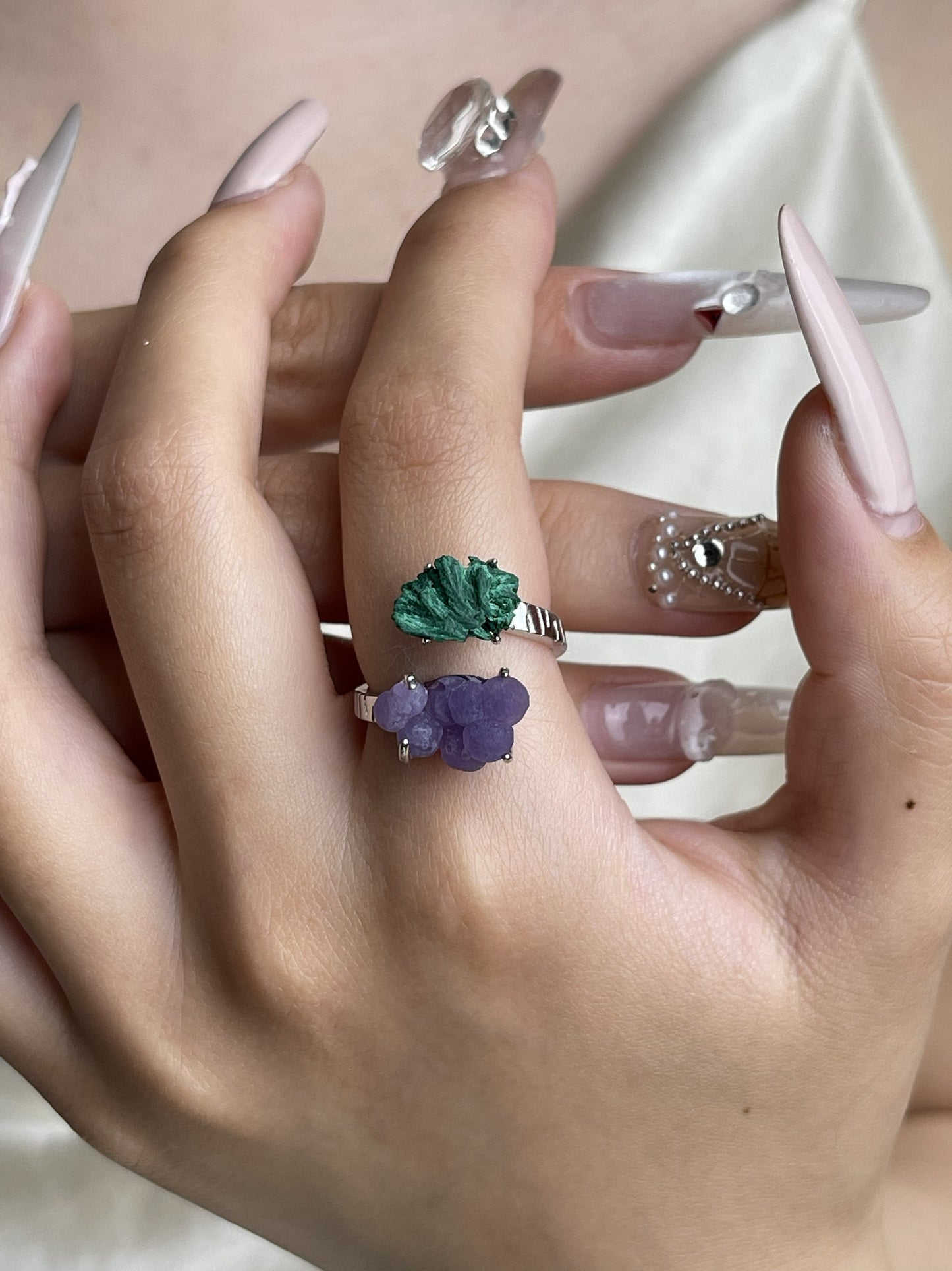 Raw Fibrous Malachite and Purple Grape Agate ring worn on hand