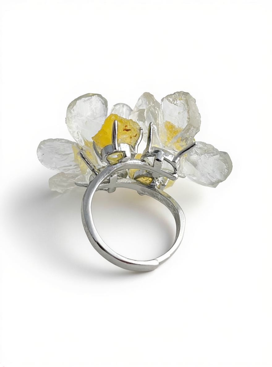 Back view of four-stone crystal ring with open band design